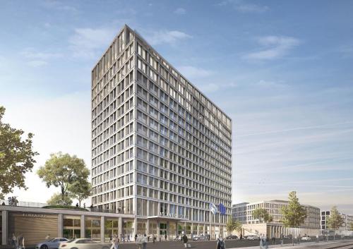 a rendering of a tall building with people in front of it at ATLANTIC Hotel Heidelberg in Heidelberg