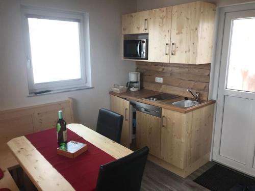 Kuchyňa alebo kuchynka v ubytovaní Chalet Schröder