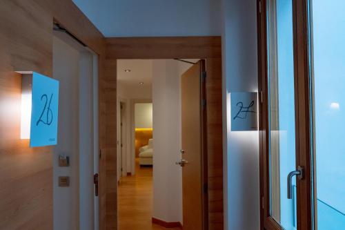 Ένα ή περισσότερα κρεβάτια σε δωμάτιο στο Hotel Boutique Párraga Siete