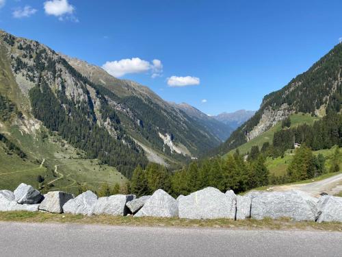 a group of rocks on the side of a road at Ferienwohnung Streng in Faggen