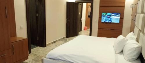 Postel nebo postele na pokoji v ubytování Fahrenheit Apartments