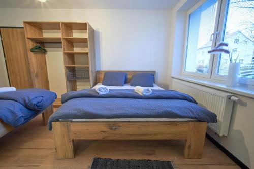 Apartmány U Rodinkyにあるベッド