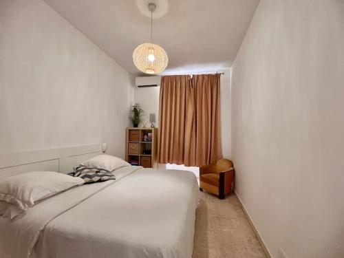 Postel nebo postele na pokoji v ubytování Cannes : Commandant André/Florian pieton