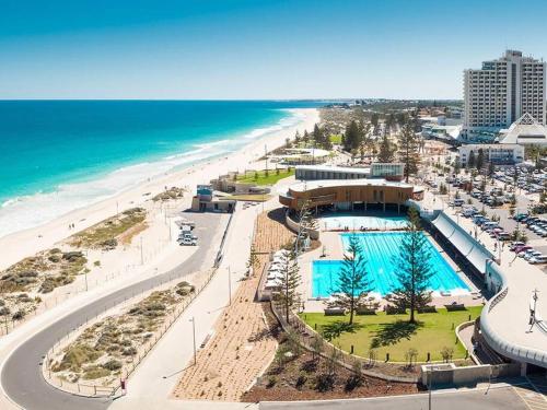 an aerial view of a resort and the beach at Studio A - Small Gem On The Busy Road in Perth