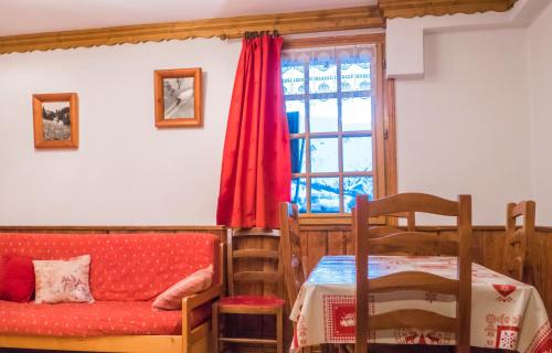 En eller flere senge i et værelse på appartement charmille