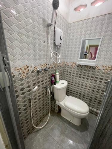 Ванная комната в RH Homestay 2