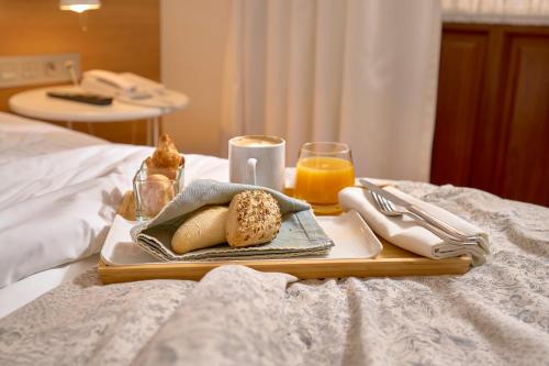 Ένα ή περισσότερα κρεβάτια σε δωμάτιο στο Hotel Boutique Párraga Siete