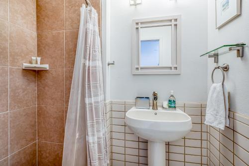 a bathroom with a sink and a shower at 20 S Angel Fire Rd #103 in Angel Fire
