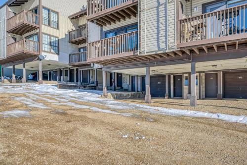 an empty street in front of a apartment building at 20 S Angel Fire Rd #103 in Angel Fire