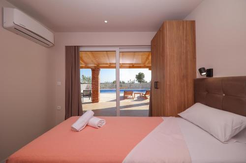 Giường trong phòng chung tại Villa Bukovica