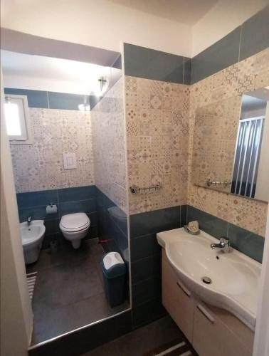 Ванная комната в Casa vacanze Lu rizzaru