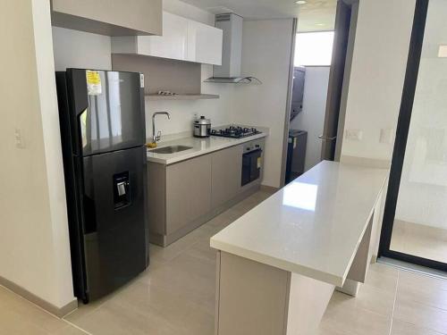 Virtuvė arba virtuvėlė apgyvendinimo įstaigoje Cómodo Apartamento en Manizales