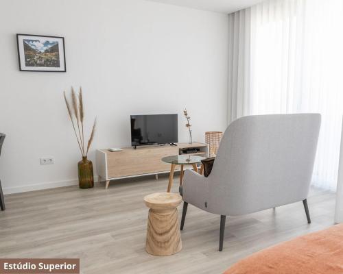 Televisyen dan/atau pusat hiburan di TRIADE Apartamentos