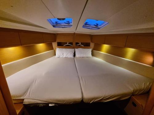 a large bed in the back of a boat at Velero Monia in Valencia