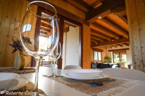 a wine glass sitting on top of a table at Artesoro Baserria in San Pedro de Galdames