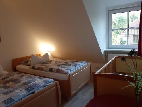 Postel nebo postele na pokoji v ubytování Ferienwohnung Zinne-Wigger