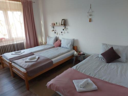 Postel nebo postele na pokoji v ubytování Scala Studio Apartments