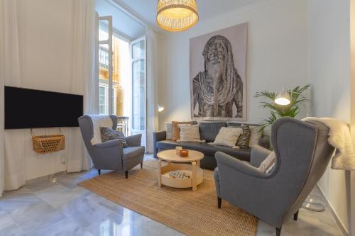 Puerta de Larios: Central three-bedroom apartment with balconies and patio