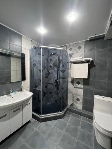 Koupelna v ubytování Rooms Hotel Semey