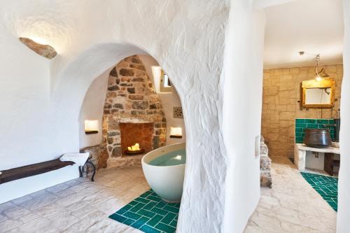 Koupelna v ubytování Trulli OraziO