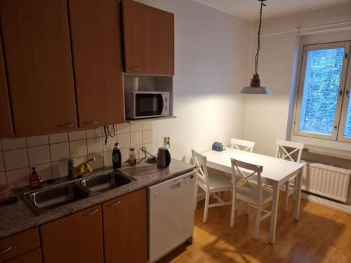 Virtuvė arba virtuvėlė apgyvendinimo įstaigoje City home Kulmakartano