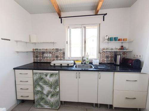 Dapur atau dapur kecil di Aloe Vera Shared House