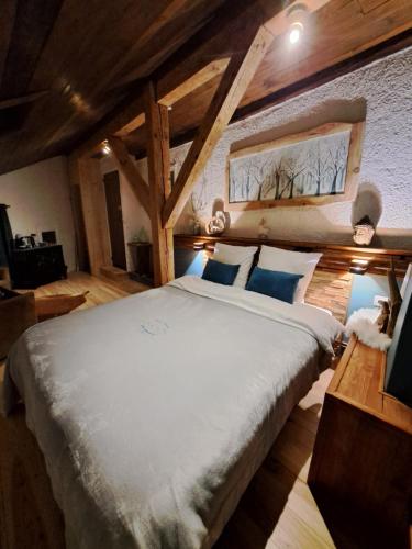 Un pat sau paturi într-o cameră la La Maïta