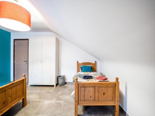 Ένα ή περισσότερα κρεβάτια σε δωμάτιο στο Holiday home in Wallonie with garden