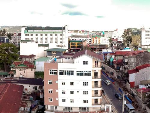 an overhead view of a city with buildings at Visita highland Inn in Baguio