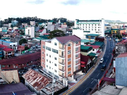 an overhead view of a city with a street and buildings at Visita highland Inn in Baguio