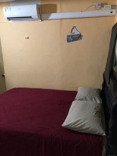 Postel nebo postele na pokoji v ubytování Posada Casamar2 alojamiento en San Andrés islas