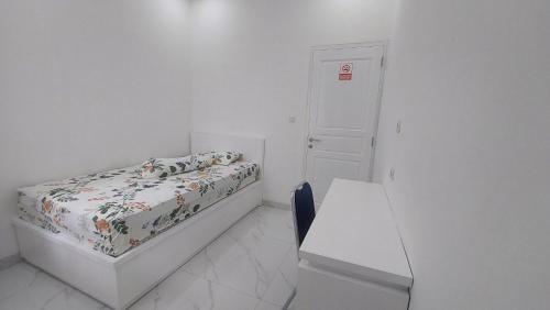 Hotel Wisma Mangurnaにあるベッド
