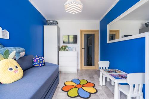 Телевизор и/или развлекательный центр в Apartament AquaTower Oliwia & Laura REKIN