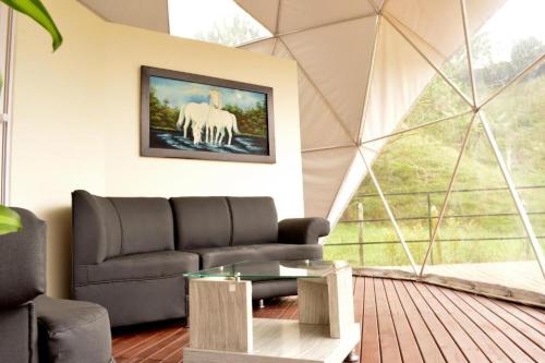 Χώρος καθιστικού στο La Quinta Dimensión Glamping