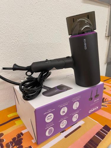 a wii remote sitting on top of a box at NEW 20PX 5BR V KTV & JACUZZI SPA & POOL TABLE at TOWN CENTER & USM - kids pool no more in Gelugor