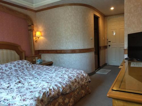 TV a/nebo společenská místnost v ubytování New Daxi B&B