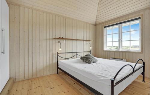 Tempat tidur dalam kamar di 3 Bedroom Beautiful Home In Slagelse