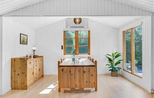 a white bathroom with a sink and a window at Beautiful Home In Jægerspris With Wifi in Jægerspris