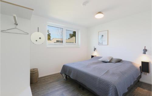 Ένα ή περισσότερα κρεβάτια σε δωμάτιο στο Beautiful Home In Lembruchdümmer See