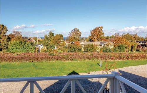 a view of a park from a balcony at Holiday Home Strandgårdsvej Iv in Bro