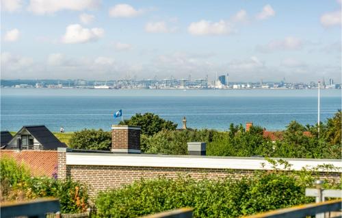 a view of the ocean and a city at Lovely Home In Knebel With Sauna in Skødshoved Strand