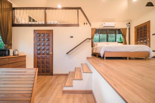 Ένα ή περισσότερα κρεβάτια σε δωμάτιο στο Kenaray Farmstay riverside