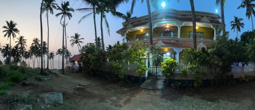 Κήπος έξω από το Kovalam Beach House