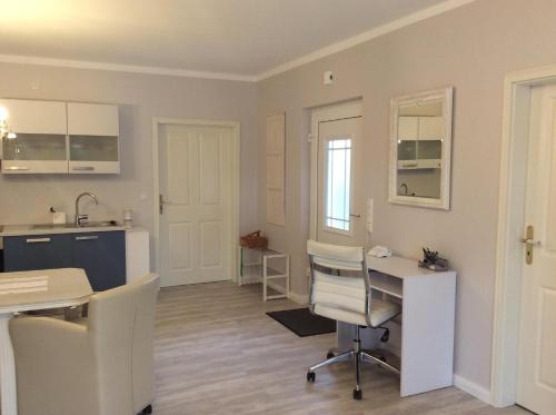 Køkken eller tekøkken på Kleine Villa Marleen, Ferienwohnung