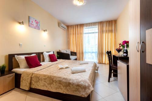 Ένα ή περισσότερα κρεβάτια σε δωμάτιο στο Hotel St Valentine all inclusive