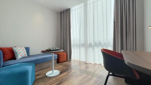 Posezení v ubytování Holiday Inn Express Yangjiang City Center by IHG