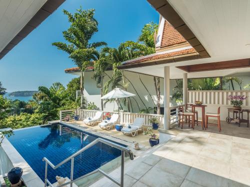 an image of a swimming pool in a house at Villa Mauao - Luxury Villa in Katamanda, Kata in Kata Beach