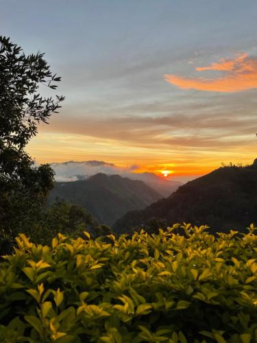 a view of the sunset from a mountain at Glorious Nature Inn in Ella