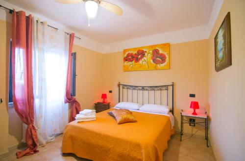 Katil atau katil-katil dalam bilik di Agriturismo La Fattoria