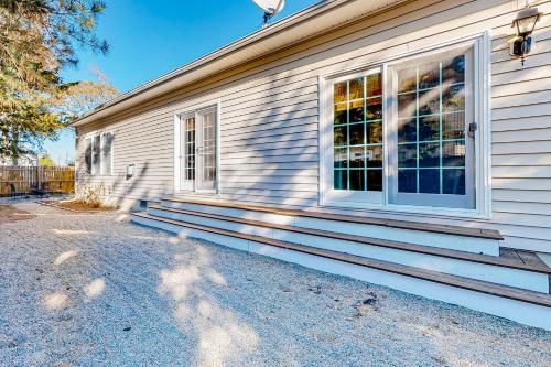 a house with a window on the side of it at Breezewood 139 Whisperwood Ln in Rehoboth Beach